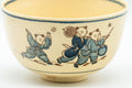 Tezumi — Japanese Matcha Bowl - Blue Trim Playful Villagers Kyo-yaki Chawan - 400ml — tipped to show the interior