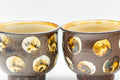 Tezumi — Japanese Teacups - Pair of Brown and Beige Spotted Yunomi - 150ml — tipped to show the interior