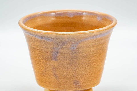 Tezumi — Japanese Teacup - Crazed Beige-Orange Hagi-yaki Yunomi - 150ml — tipped to show the interior