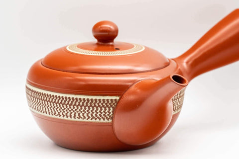 Tezumi — Japanese Kyusu - Engraved Yellow Striped Tokoname-yaki Teapot - 290ml — closeup of the decoration