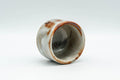 Tezumi — Japanese Teacup - Orange Milky White Shino Glazed Guinomi - 50ml — three-quarter view