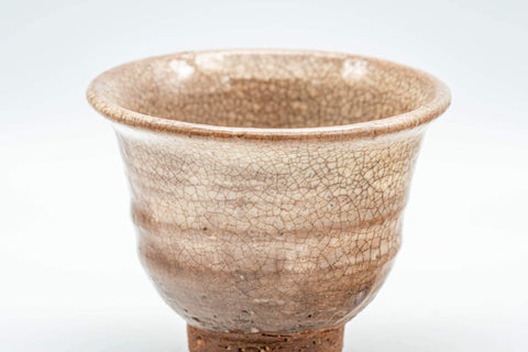 Tezumi — Japanese Teacup - Brown and Milky White Hagi-yaki Yunomi - 100ml — tipped to show the interior