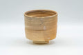 Tezumi — Japanese Teacup - Beige Kanji Hagi-yaki Yunomi - 140ml — front view from another angle