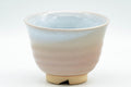 Tezumi — Japanese Teacup - Peach and Blue Interior Glazed Hagi-yaki Yunomi - 120ml — tipped to show the interior