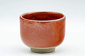 Tezumi — Japanese Teacup - Red Glazed Guinomi - 65ml — tipped to show the interior