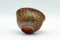 Japanese Teacup - Green Ash Glazed Tokoname-yaki Yunomi - 80ml - the cup tilted to show the interior and rim