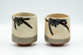 Tezumi — Japanese Teacups - Pair of Beige Sankaku-gata Triangular Yunomi - 200ml — front view