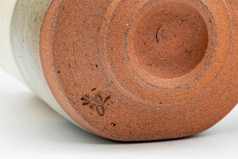 Tezumi — Japanese Teacups - Pair of Beige Sankaku-gata Triangular Yunomi - 200ml — tipped to show the interior