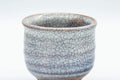 Tezumi — Japanese Teacup - White Glazed Hagi-yaki Guinomi - 60ml — tipped to show the interior
