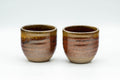 Tezumi — Japanese Teacups - Pair of Red Honey Drip-Glazed Yunomi - 90ml — front view from another angle