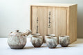Japanese Tea Set - Notomi Choun, Daikazan Kiln - Beige Hagi-yaki Do-ake Kyusu Teapot with 5 Yunomi Teacups - the full tea set displayed with its signed wooden box