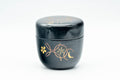 Tezumi — Japanese Natsume - Floral Geometric Black Lacquer Matcha Tea Caddy - 100ml — lid removed beside the body