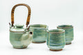 Japanese Tea Set - Green Glazed Dobin Do-ake Teapot with Katakuchi Water Cooler and 2 Yunomi Teacups - group shot of the dobin teapot with the water cooler and two yunomi teacups