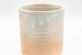 Tezumi — Japanese Teacup - Beige White Drip-Glazed Hagi-yaki Yunomi - 150ml — tipped to show the interior