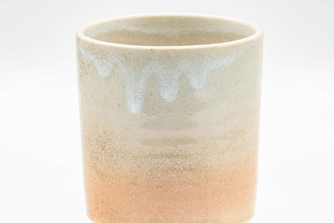 Tezumi — Japanese Teacup - Beige White Drip-Glazed Hagi-yaki Yunomi - 150ml — tipped to show the interior