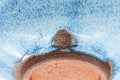 Tezumi — Japanese Yuzamashi - Blue Shino Glazed Ushirode Water Cooler - 150ml — closeup of the foot