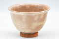 Tezumi — Japanese Teacup - Beige Gohonte Hagi-yaki Yunomi - 140ml — tipped to show the interior