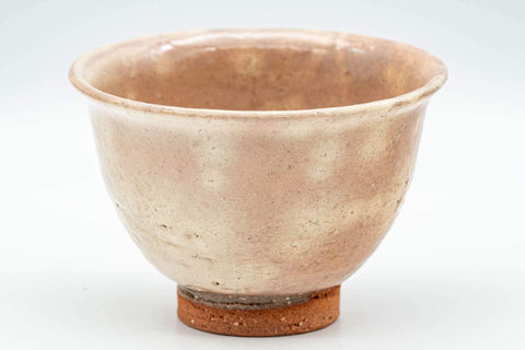 Tezumi — Japanese Teacup - Beige Gohonte Hagi-yaki Yunomi - 140ml — tipped to show the interior
